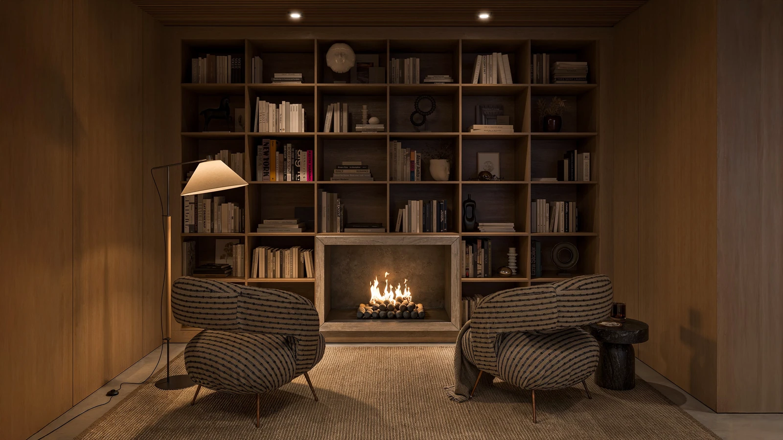 São Paulo Apartment — fireplace and reading area
